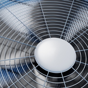 A closeup of the fan of an AC unit after undergoing Air Conditioning Service in Bloomington IL