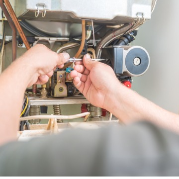 Technician performing new Furnace Installation in Normal IL