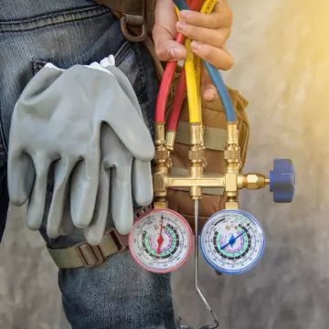 An AC Technician ready to provide HVAC and appliance service in Champaign-Urbana